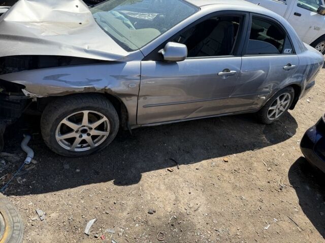 Серый Мазда 6, объемом двигателя 2 л и пробегом 200 тыс. км за 850 $, фото 1 на Automoto.ua