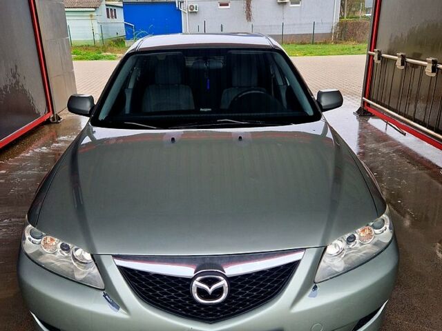 Серый Мазда 6, объемом двигателя 2 л и пробегом 317 тыс. км за 3200 $, фото 1 на Automoto.ua