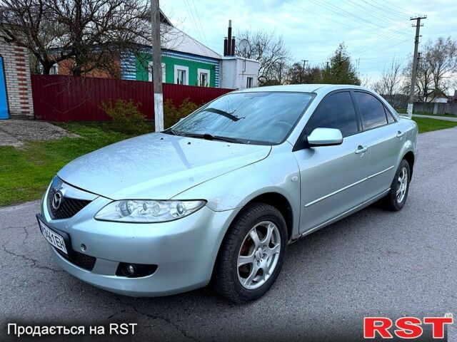 Серый Мазда 6, объемом двигателя 2 л и пробегом 265 тыс. км за 3350 $, фото 1 на Automoto.ua