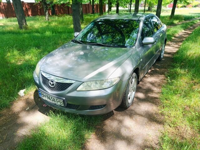 Серый Мазда 6, объемом двигателя 2 л и пробегом 319 тыс. км за 4100 $, фото 1 на Automoto.ua