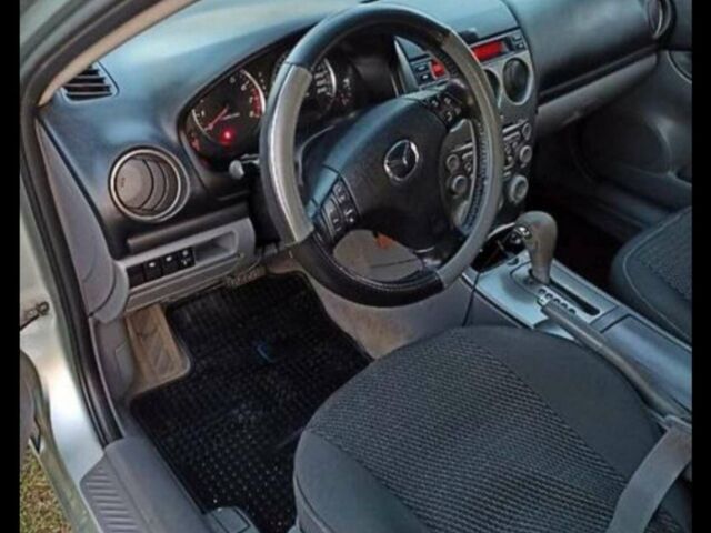 Серый Мазда 6, объемом двигателя 2 л и пробегом 230 тыс. км за 4200 $, фото 1 на Automoto.ua