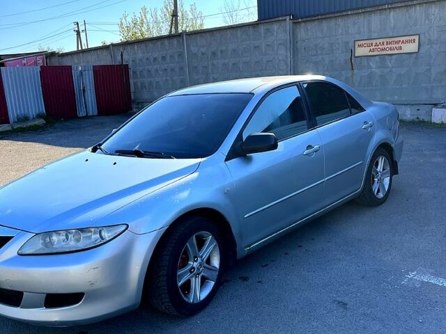 Серый Мазда 6, объемом двигателя 2 л и пробегом 265 тыс. км за 2500 $, фото 1 на Automoto.ua