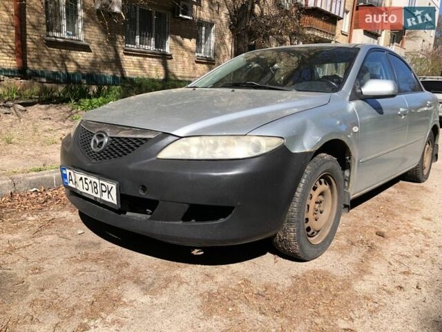 Серый Мазда 6, объемом двигателя 1.8 л и пробегом 298 тыс. км за 4200 $, фото 1 на Automoto.ua
