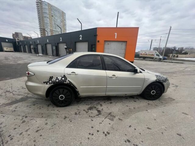 Серый Мазда 6, объемом двигателя 2 л и пробегом 300 тыс. км за 2000 $, фото 1 на Automoto.ua