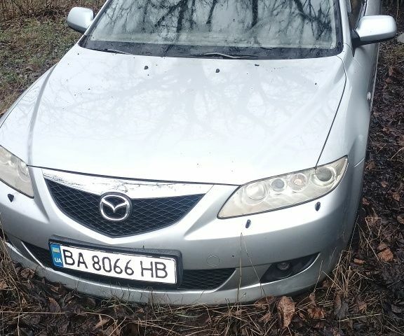 Серый Мазда 6, объемом двигателя 2 л и пробегом 239 тыс. км за 3500 $, фото 1 на Automoto.ua