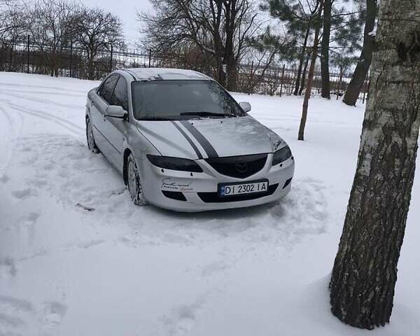 Серый Мазда 6, объемом двигателя 2 л и пробегом 199 тыс. км за 4350 $, фото 1 на Automoto.ua