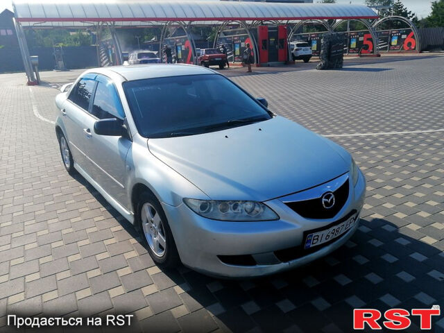 Серый Мазда 6, объемом двигателя 2 л и пробегом 559 тыс. км за 3600 $, фото 1 на Automoto.ua