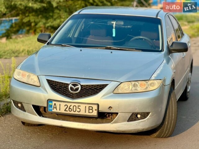 Серый Мазда 6, объемом двигателя 1.8 л и пробегом 392 тыс. км за 2000 $, фото 1 на Automoto.ua
