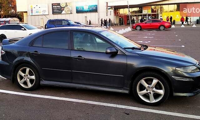 Серый Мазда 6, объемом двигателя 2.3 л и пробегом 157 тыс. км за 4800 $, фото 1 на Automoto.ua