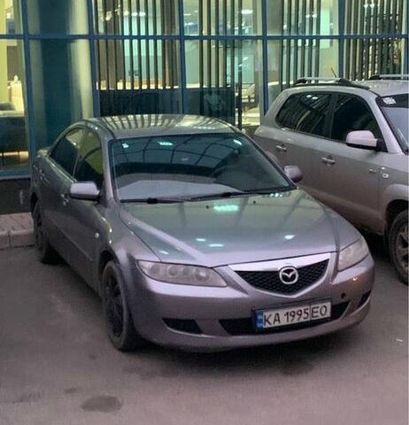 Серый Мазда 6, объемом двигателя 2 л и пробегом 300 тыс. км за 3000 $, фото 1 на Automoto.ua