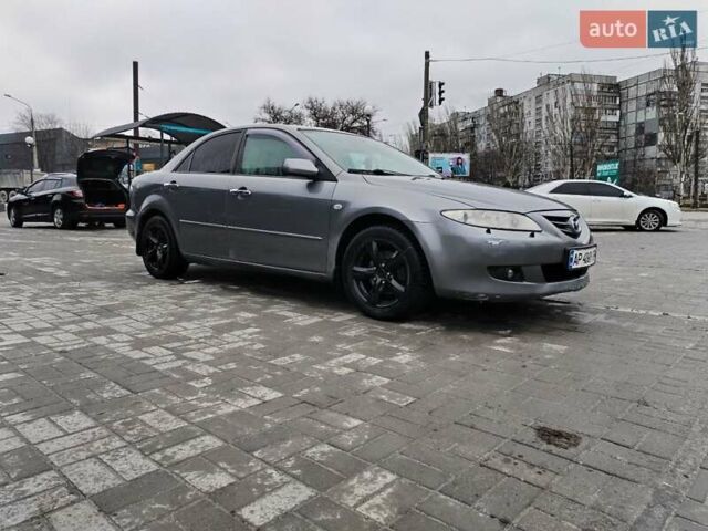 Серый Мазда 6, объемом двигателя 2 л и пробегом 241 тыс. км за 4700 $, фото 1 на Automoto.ua