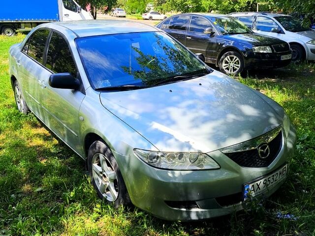 Серый Мазда 6, объемом двигателя 2 л и пробегом 254 тыс. км за 2800 $, фото 1 на Automoto.ua
