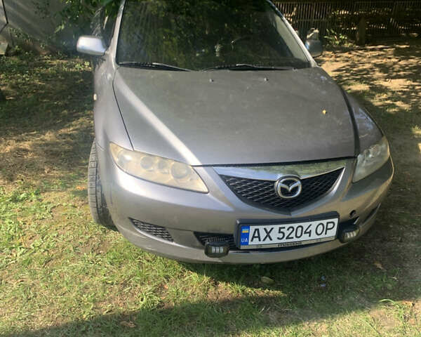 Серый Мазда 6, объемом двигателя 2 л и пробегом 365 тыс. км за 5500 $, фото 1 на Automoto.ua