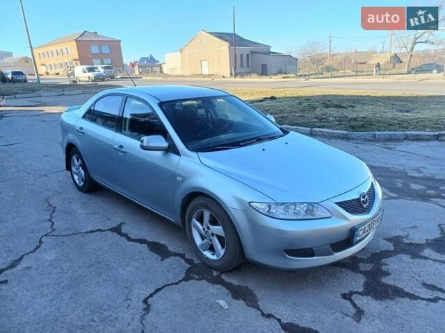 Серый Мазда 6, объемом двигателя 2 л и пробегом 290 тыс. км за 2900 $, фото 1 на Automoto.ua
