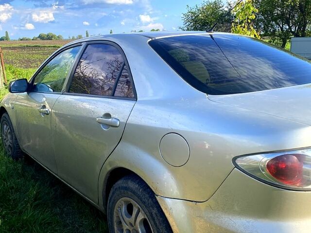 Серый Мазда 6, объемом двигателя 2 л и пробегом 300 тыс. км за 3200 $, фото 1 на Automoto.ua
