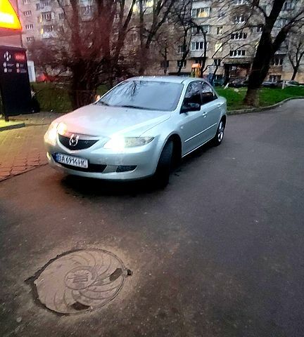 Серый Мазда 6, объемом двигателя 2 л и пробегом 211 тыс. км за 4200 $, фото 1 на Automoto.ua