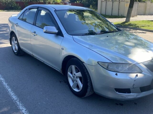 Сірий Мазда 6, об'ємом двигуна 2 л та пробігом 390 тис. км за 2600 $, фото 1 на Automoto.ua