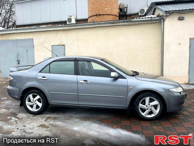 Серый Мазда 6, объемом двигателя 2 л и пробегом 260 тыс. км за 4300 $, фото 1 на Automoto.ua