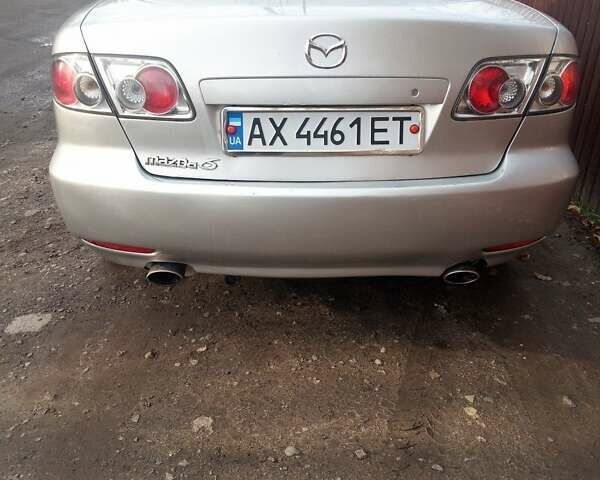Серый Мазда 6, объемом двигателя 2 л и пробегом 246 тыс. км за 4300 $, фото 1 на Automoto.ua