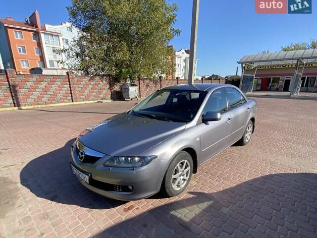 Серый Мазда 6, объемом двигателя 2 л и пробегом 301 тыс. км за 4100 $, фото 1 на Automoto.ua