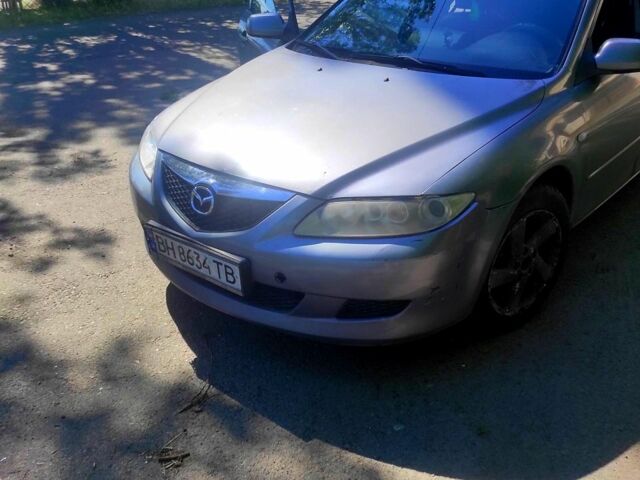 Серый Мазда 6, объемом двигателя 2 л и пробегом 298 тыс. км за 2799 $, фото 1 на Automoto.ua