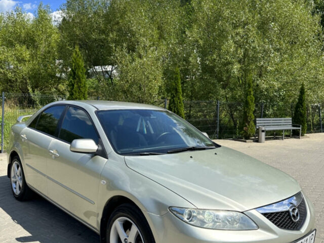 Сірий Мазда 6, об'ємом двигуна 2 л та пробігом 303 тис. км за 4450 $, фото 1 на Automoto.ua