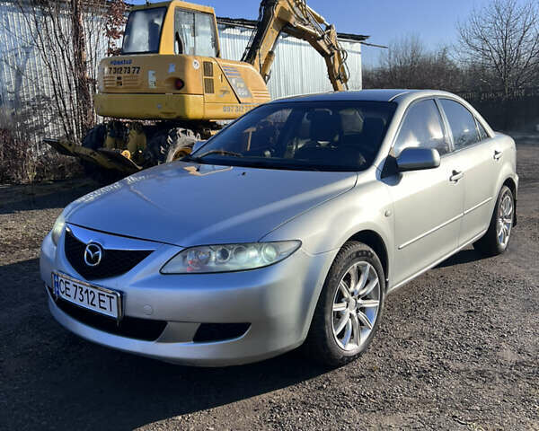 Серый Мазда 6, объемом двигателя 1.8 л и пробегом 350 тыс. км за 2750 $, фото 1 на Automoto.ua