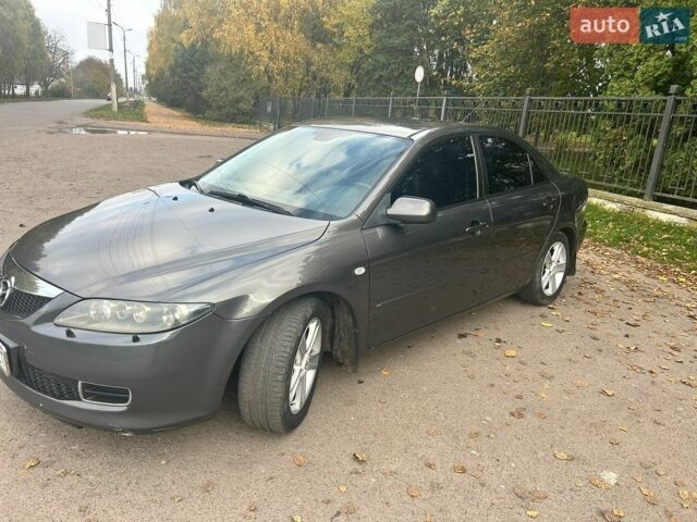 Сірий Мазда 6, об'ємом двигуна 2 л та пробігом 240 тис. км за 4350 $, фото 1 на Automoto.ua