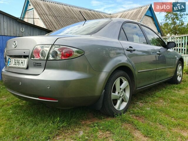 Серый Мазда 6, объемом двигателя 1.8 л и пробегом 209 тыс. км за 4800 $, фото 1 на Automoto.ua