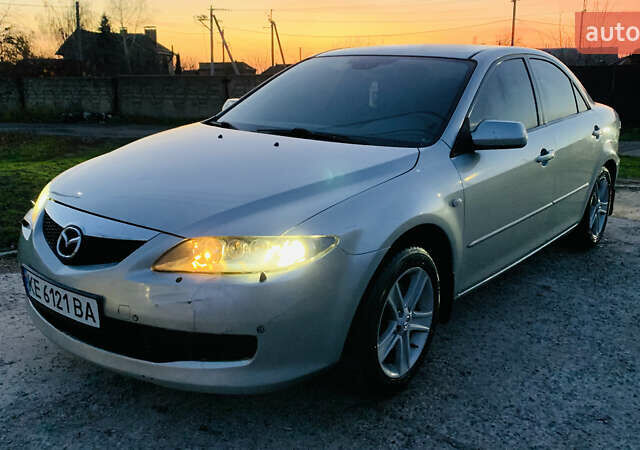 Серый Мазда 6, объемом двигателя 2 л и пробегом 310 тыс. км за 4250 $, фото 1 на Automoto.ua