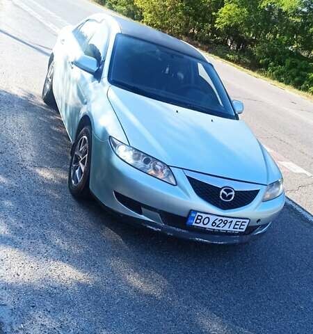 Серый Мазда 6, объемом двигателя 2 л и пробегом 272 тыс. км за 4700 $, фото 1 на Automoto.ua