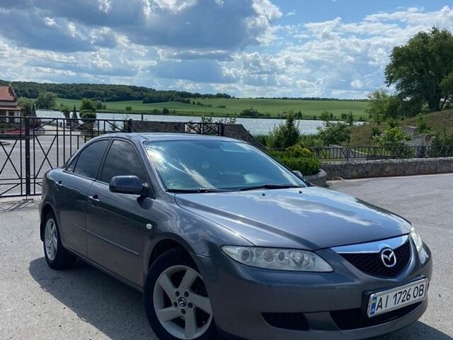 Сірий Мазда 6, об'ємом двигуна 2 л та пробігом 285 тис. км за 4500 $, фото 1 на Automoto.ua