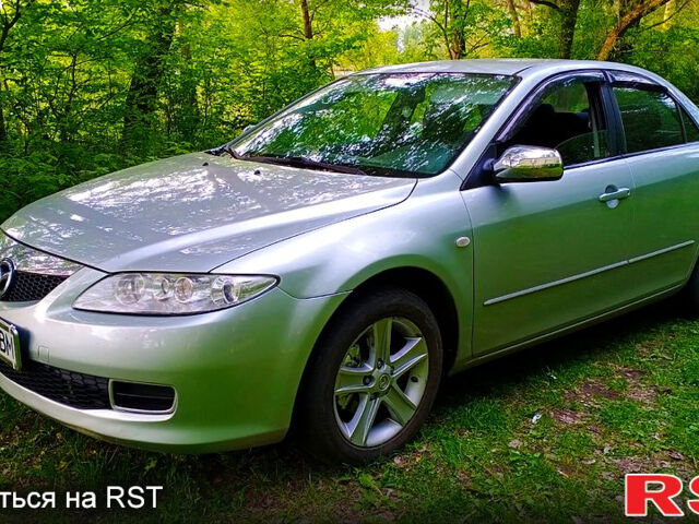 Серый Мазда 6, объемом двигателя 2 л и пробегом 200 тыс. км за 4600 $, фото 1 на Automoto.ua