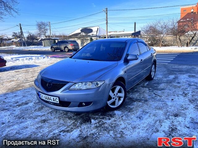 Сірий Мазда 6, об'ємом двигуна 2 л та пробігом 233 тис. км за 4999 $, фото 1 на Automoto.ua