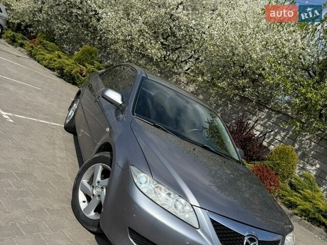 Серый Мазда 6, объемом двигателя 2 л и пробегом 218 тыс. км за 3200 $, фото 1 на Automoto.ua