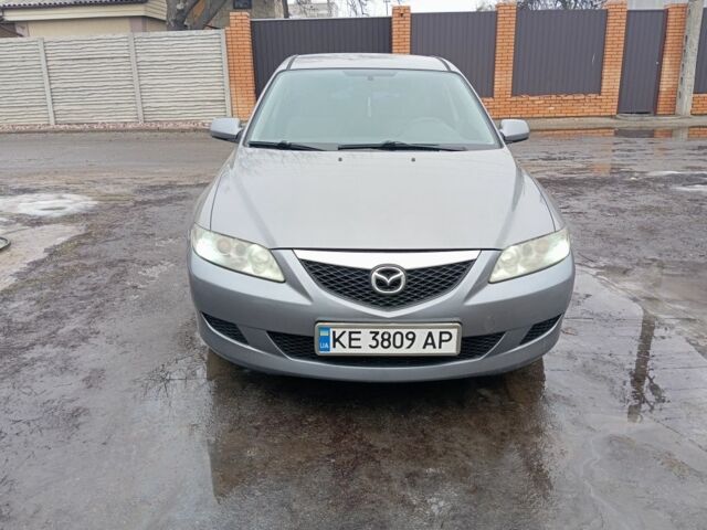Серый Мазда 6, объемом двигателя 2 л и пробегом 310 тыс. км за 4250 $, фото 1 на Automoto.ua