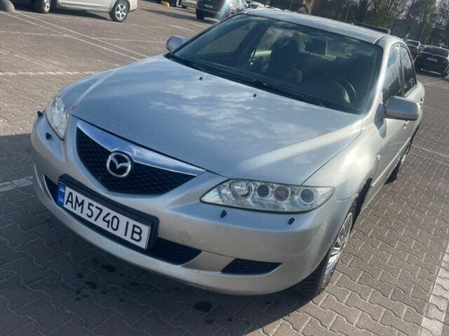 Серый Мазда 6, объемом двигателя 2 л и пробегом 295 тыс. км за 3100 $, фото 1 на Automoto.ua