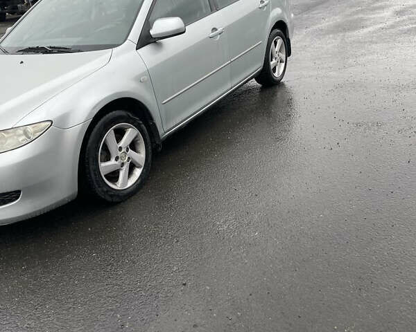 Серый Мазда 6, объемом двигателя 2 л и пробегом 180 тыс. км за 2200 $, фото 1 на Automoto.ua