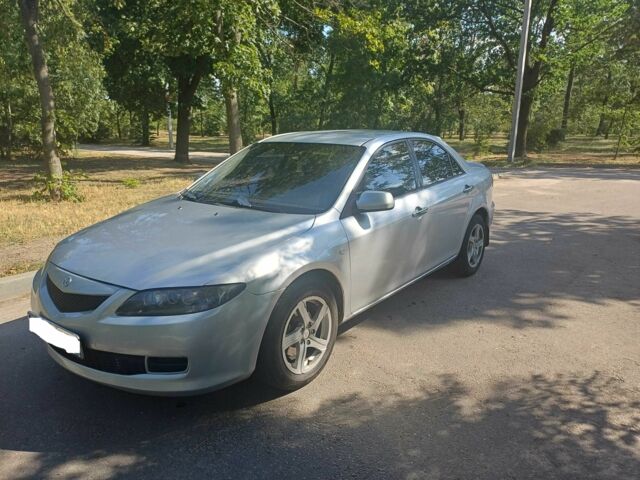 Серый Мазда 6, объемом двигателя 2 л и пробегом 247 тыс. км за 3500 $, фото 1 на Automoto.ua