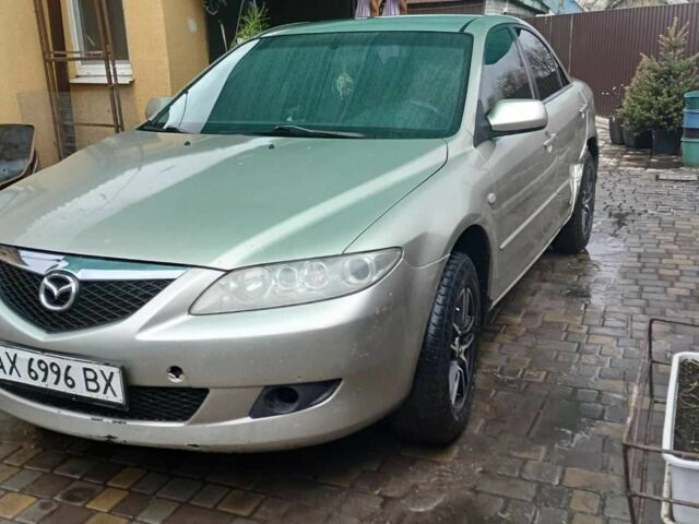 Серый Мазда 6, объемом двигателя 2 л и пробегом 291 тыс. км за 2000 $, фото 1 на Automoto.ua