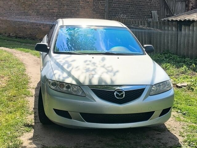 Серый Мазда 6, объемом двигателя 2 л и пробегом 290 тыс. км за 1700 $, фото 1 на Automoto.ua