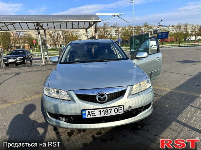 Серый Мазда 6, объемом двигателя 2 л и пробегом 295 тыс. км за 4500 $, фото 1 на Automoto.ua