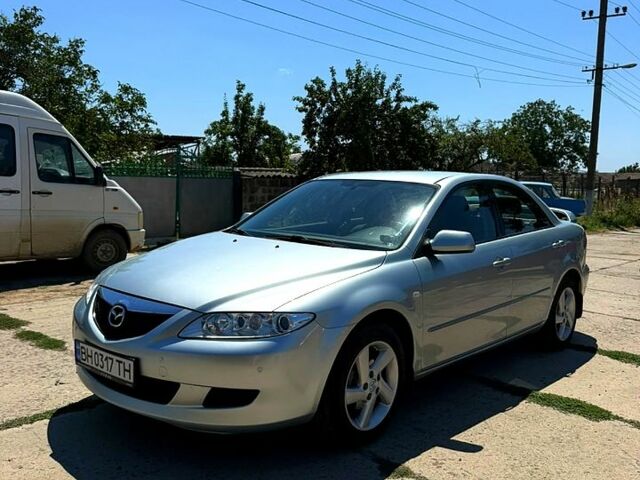 Серый Мазда 6, объемом двигателя 2 л и пробегом 145 тыс. км за 4300 $, фото 1 на Automoto.ua