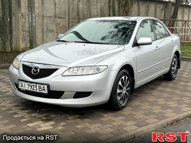 Серый Мазда 6, объемом двигателя 1.8 л и пробегом 265 тыс. км за 3800 $, фото 1 на Automoto.ua