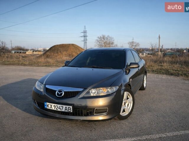 Серый Мазда 6, объемом двигателя 1.8 л и пробегом 225 тыс. км за 3899 $, фото 1 на Automoto.ua