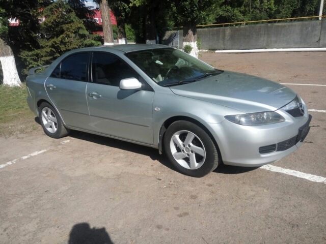 Серый Мазда 6, объемом двигателя 2 л и пробегом 223 тыс. км за 5500 $, фото 1 на Automoto.ua