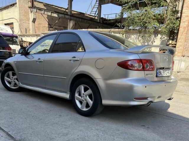 Сірий Мазда 6, об'ємом двигуна 2 л та пробігом 250 тис. км за 2399 $, фото 1 на Automoto.ua