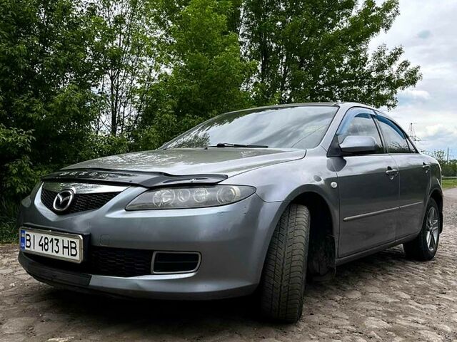 Серый Мазда 6, объемом двигателя 1.8 л и пробегом 221 тыс. км за 3700 $, фото 1 на Automoto.ua