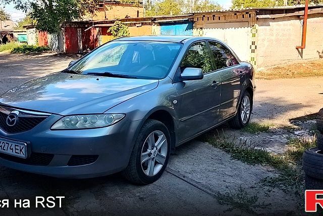 Серый Мазда 6, объемом двигателя 1.8 л и пробегом 306 тыс. км за 4000 $, фото 1 на Automoto.ua