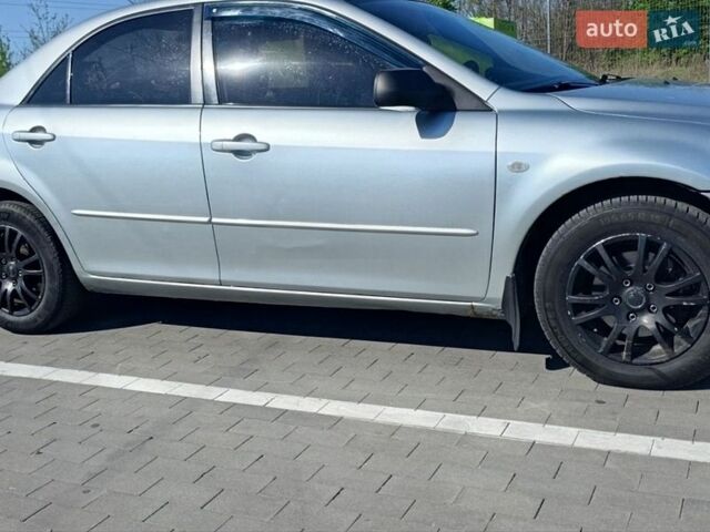 Серый Мазда 6, объемом двигателя 2 л и пробегом 340 тыс. км за 3800 $, фото 1 на Automoto.ua
